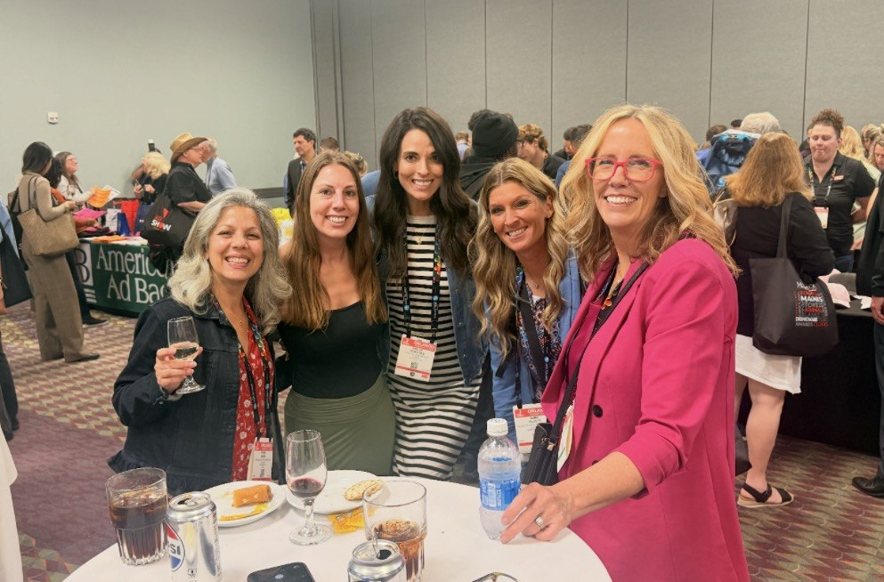 Shawna with attendees at conference