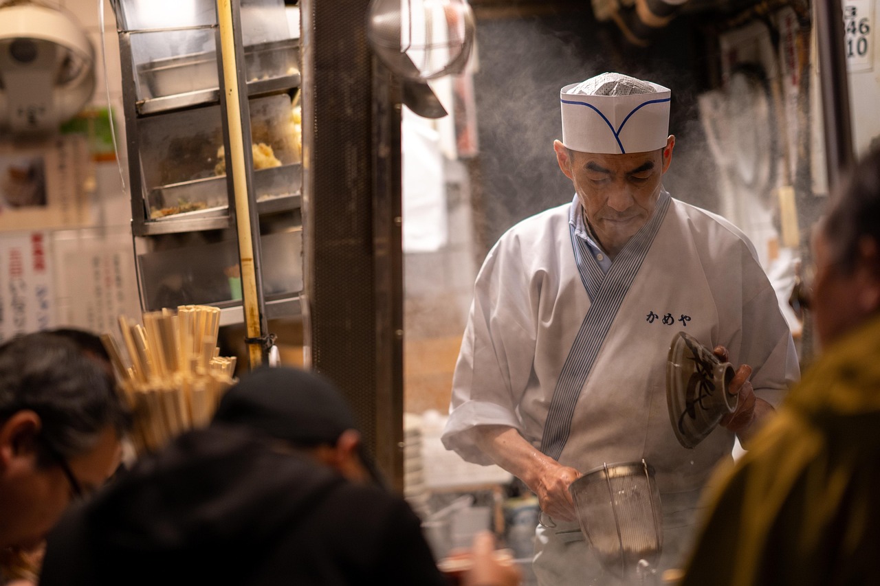 Chef working in a small Japanese restaurant -- the kind of small business that builds real customer loyalty