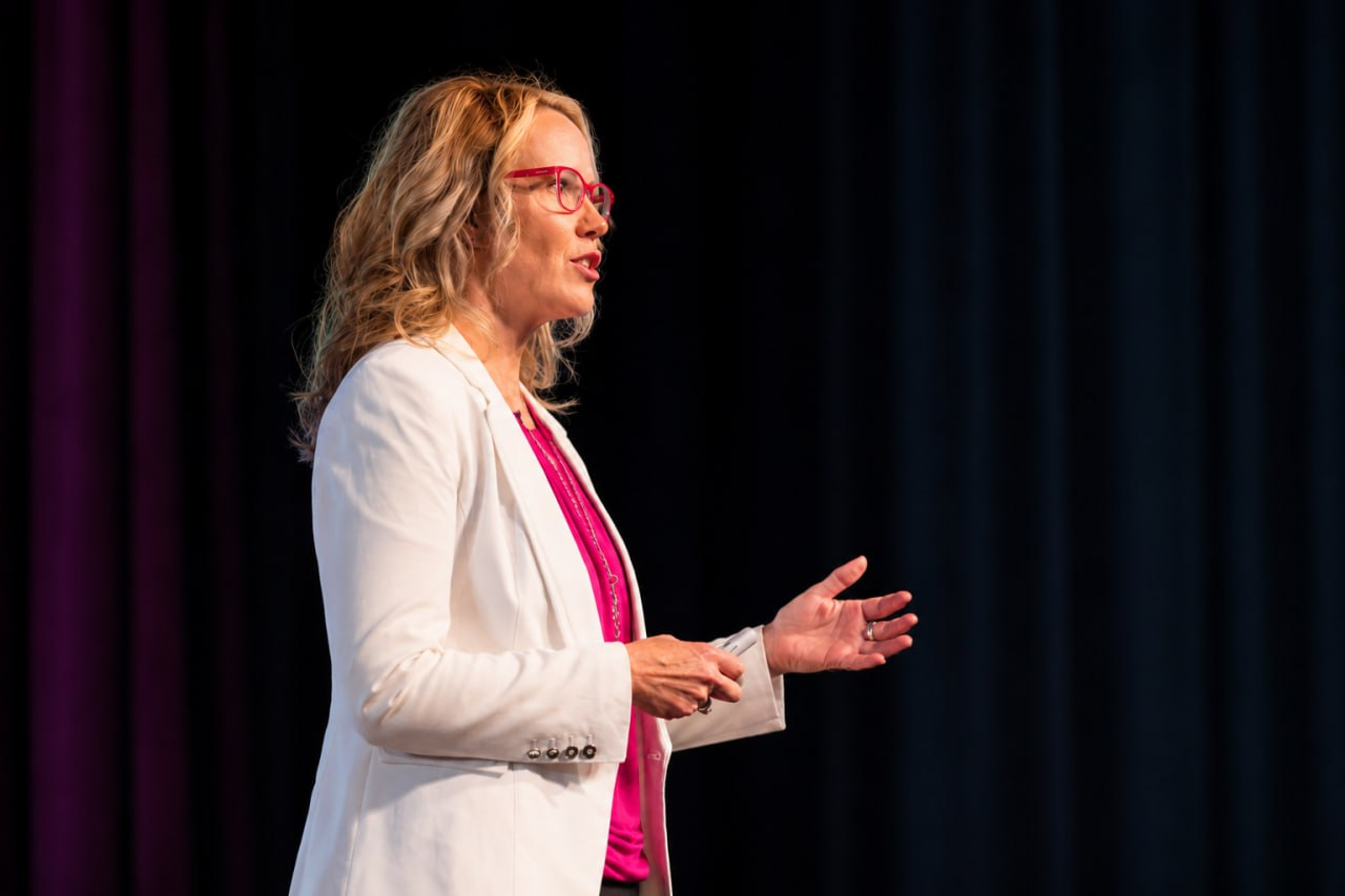 Shawna Suckow delivering an energetic keynote presentation